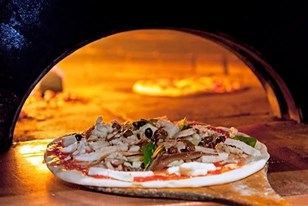 Qui connaît une pizzeria artisanale de QUALITE, du genre cuisson au feu de bois, pour changer des chaînes ?