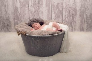 Qui connaît un bon photographe pour des photos de bébé nouveau-né ?